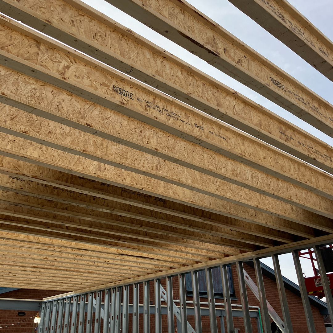 Photograph of the new roof trusses in the expansion at the library.