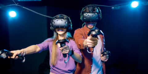 Two friends battling in VR