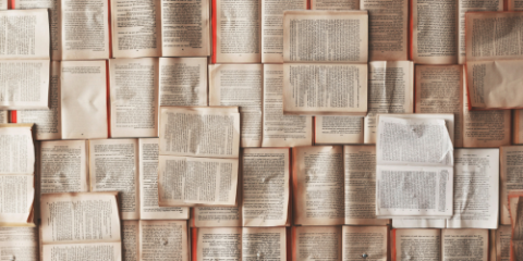 wall of book pages