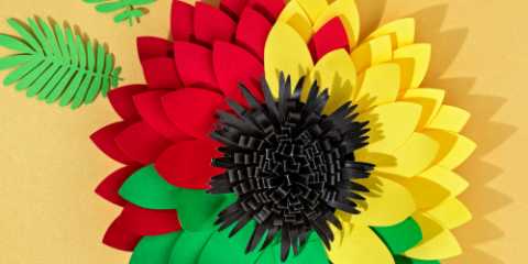 yellow, green, red flower for juneteenth
