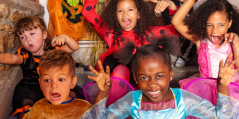 group of children in halloween costumes