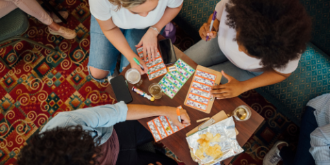 group of friends playing bingo