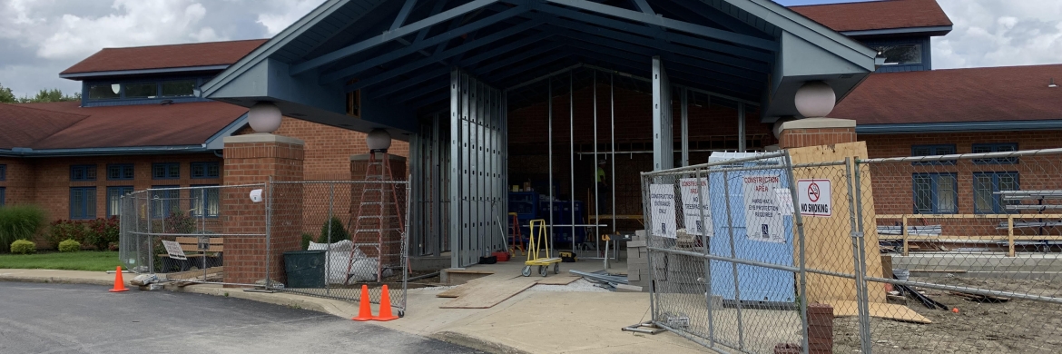 Photo of the front facade of the Geneva Branch under renovation.